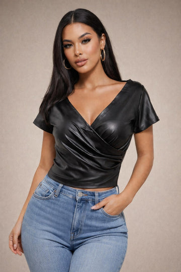 Unleash your boldest self in this statement-making faux top that refuses to play it safe. Crafted 