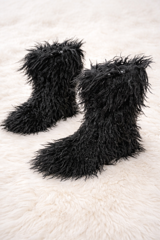 Step into bold sophistication with these Luxe Shag Fur Boots. Crafted with sumptuous shag fur 