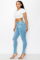 High Rise Destructed Stretch Skinny Jeans