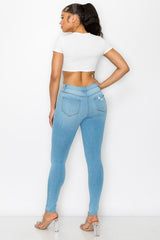 High Rise Destructed Stretch Skinny Jeans