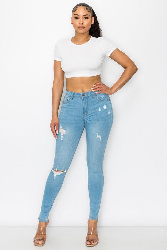 High Rise Destructed Stretch Skinny Jeans