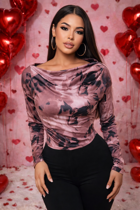 Unleash your bold side with the Muse Abstract Mesh Top—a fearless statement piece that commands  