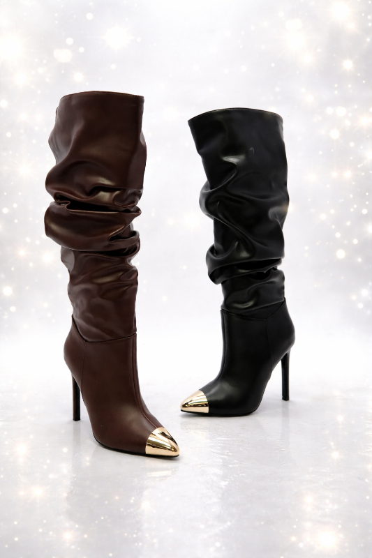 Step into bold confidence with these slouchy knee-high stiletto boots.